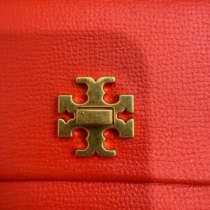 Tory Burch small envelop style wallet with Gold Emblem